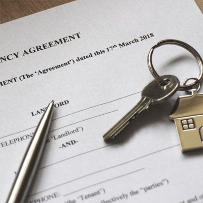 Rental agreement and property keys for a buy-to-let home loan